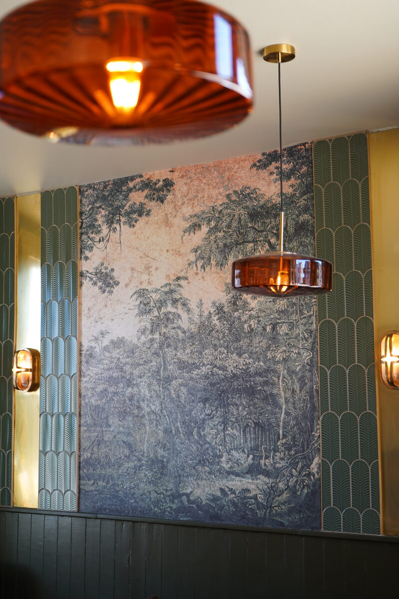 Green-tiled mural detail